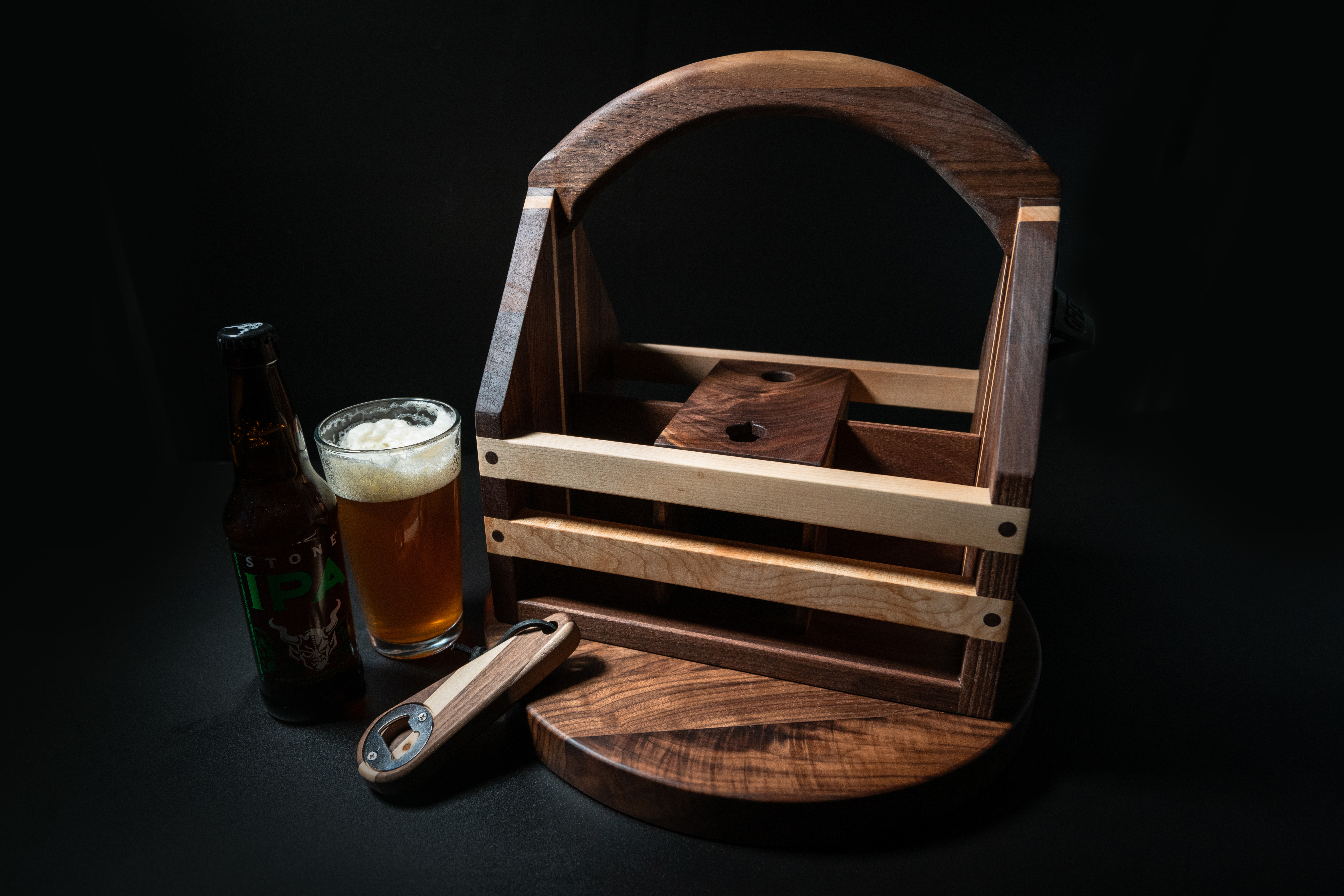 Handmade walnut and maple beer caddy with a matching bottle opener